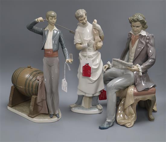 A Lladro figure of a Beethoven, The Obstetrician and The Wine Taster